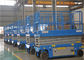 Angkat Gunting Pallet Vertikal 24V 3.3KW 2520kg Berat Kelas Industri Bergerak